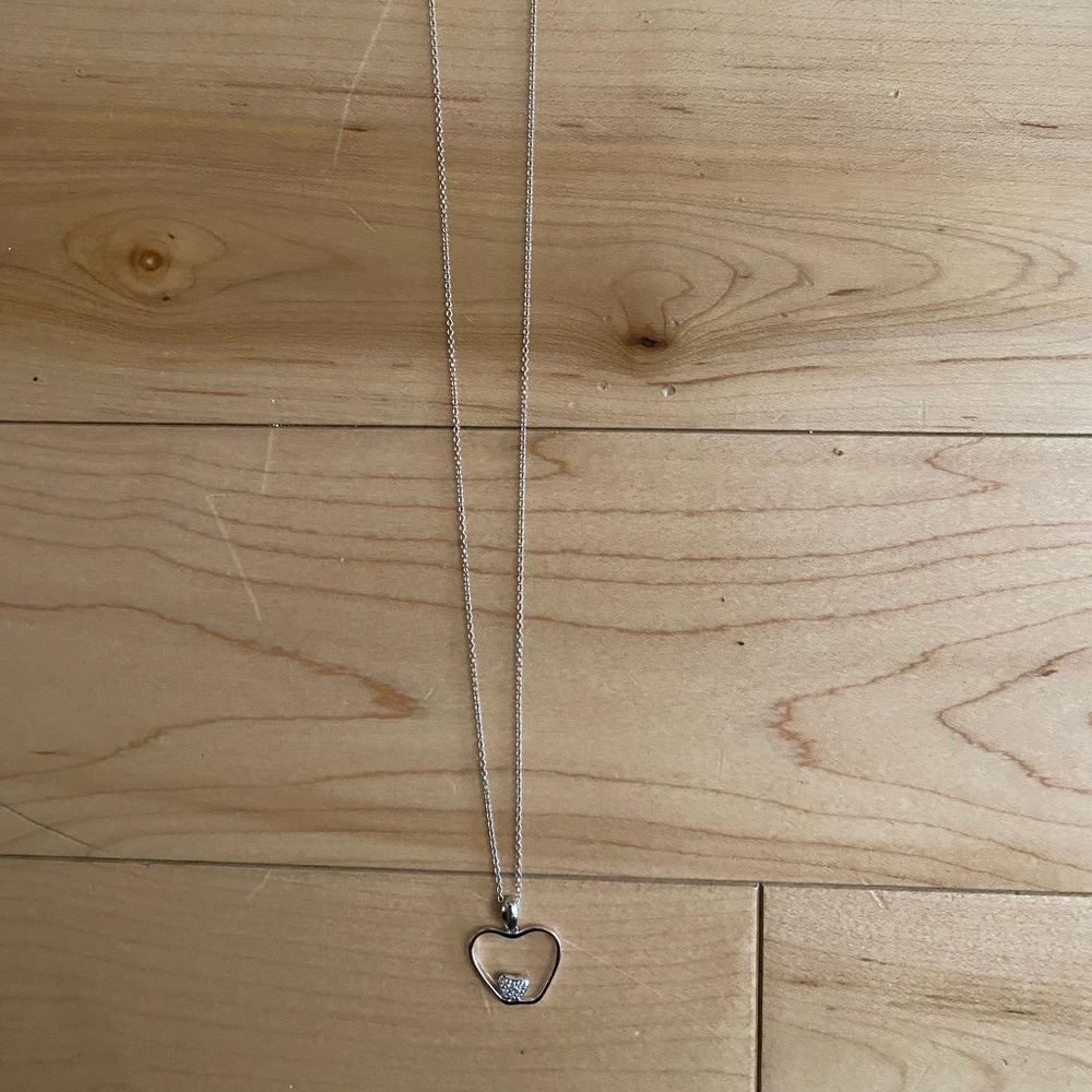 14 Karat white gold apple pendant with sterling silver chain with diamonds